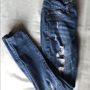 Stressed Torn Skinny Jeans